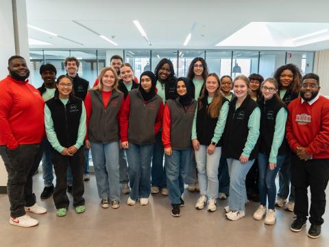 A group of students in D'Youville clothing